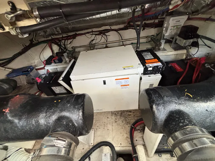  Yacht Photos Pics Engine room of 2000 Cruisers Yachts 3870 Express with generator and wiring.