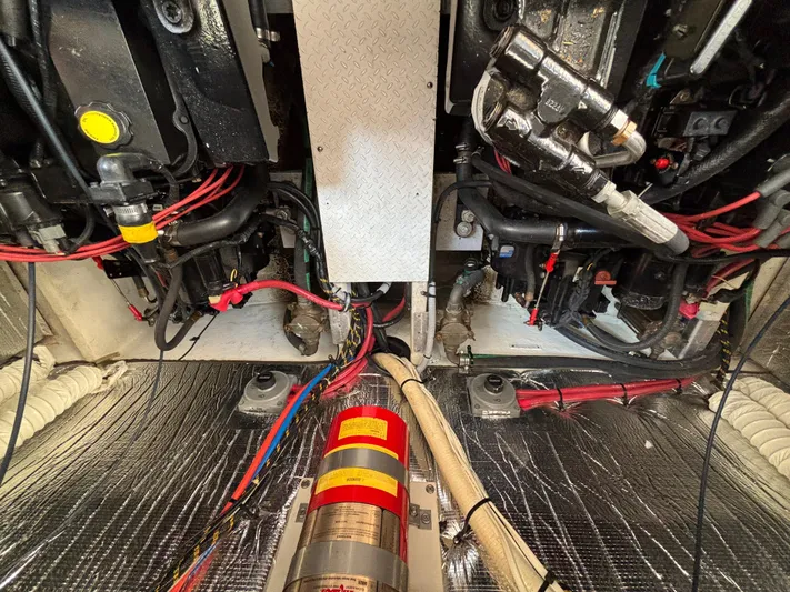  Yacht Photos Pics Engine room of 2000 Cruisers Yachts 3870 Express with visible wiring and components.