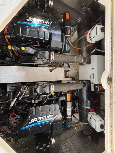  Yacht Photos Pics Engine compartment of 2000 Cruisers Yachts 3870 Express with Mercury MerCruiser engines.