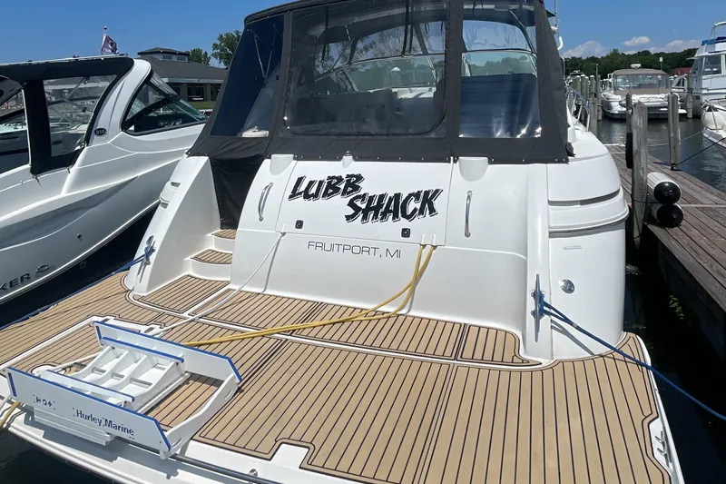  Yacht Photos Pics 2000 Cruisers Yachts 3870 Express docked, featuring "Lubb Shack" name and Fruitport, MI location.