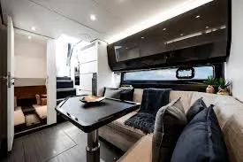 47 Verve Yacht Photos Pics Luxurious interior of 2021 Azimut Verve 47 yacht with modern seating and elegant decor.