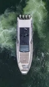 47 Verve Yacht Photos Pics Aerial view of 2021 Azimut Verve 47 yacht cruising on water.