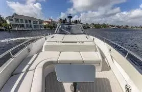 47 Verve Yacht Photos Pics 2021 Azimut Verve 47 yacht cruising on a sunny day, showcasing luxurious deck and seating.