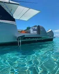 47 Verve Yacht Photos Pics Azimut Verve 47 yacht, 2021 model, on clear turquoise water under a sunny sky.