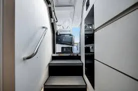 47 Verve Yacht Photos Pics Interior stairs of 2021 Azimut Verve 47 yacht, featuring sleek modern design.