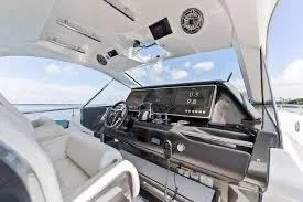 47 Verve Yacht Photos Pics Interior view of 2021 Azimut Verve 47 yacht cockpit with modern controls and seating.