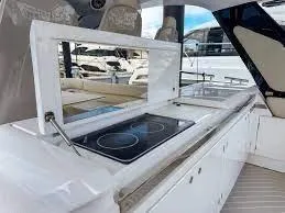 47 Verve Yacht Photos Pics Outdoor kitchen on 2021 Azimut Verve 47 yacht with stovetop and counter space.
