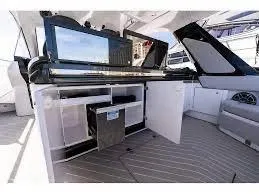 47 Verve Yacht Photos Pics 2021 Azimut Verve 47 yacht interior with open storage compartments and sleek design.
