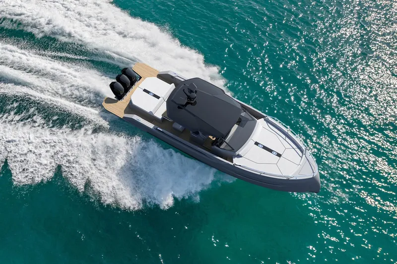 Nv47 Yacht Photos Pics Aerial view of 2026 Navise NV47 speedboat cruising on turquoise water.