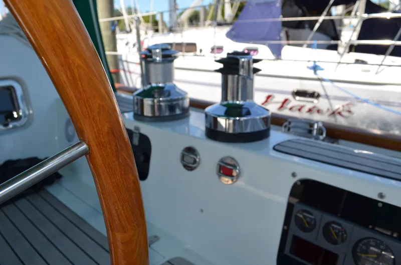 Fleur De Lys Yacht Photos Pics Cockpit of 1986 Hans Christian Christina sailboat with wooden wheel and winches.