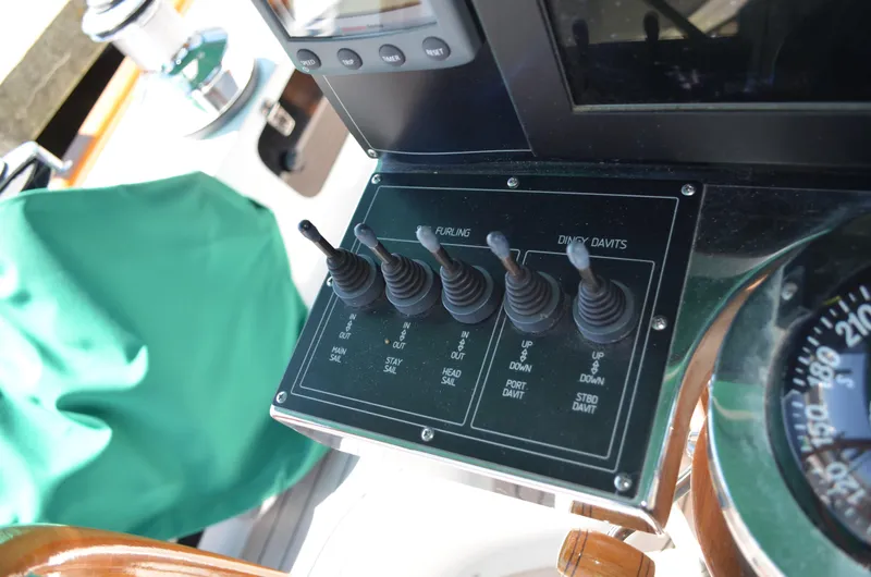 Fleur De Lys Yacht Photos Pics Control panel on 1986 Hans Christian Christina yacht with switches and compass.