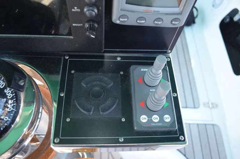 Fleur De Lys Yacht Photos Pics Control panel of 1986 Hans Christian Christina boat with joysticks and compass.