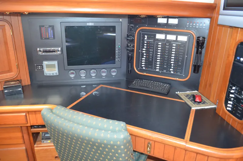 Fleur De Lys Yacht Photos Pics Navigation station of 1986 Hans Christian Christina yacht with control panel and instruments.