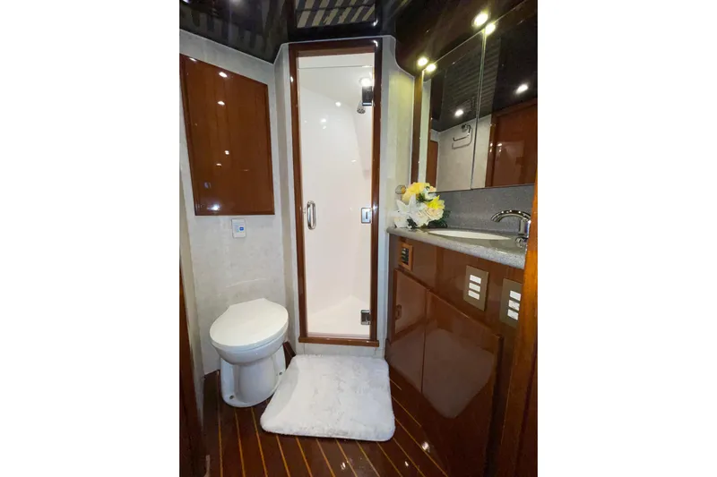  Yacht Photos Pics Luxurious bathroom in 2003 Egg Harbor 37 Sport Fisher yacht with shower and vanity.