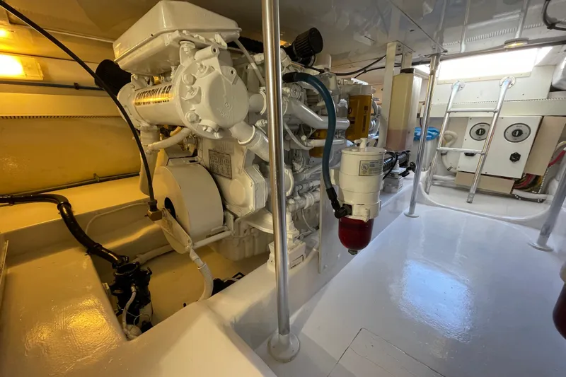  Yacht Photos Pics Engine room of 2003 Egg Harbor 37 Sport Fisher, showcasing clean and organized machinery.