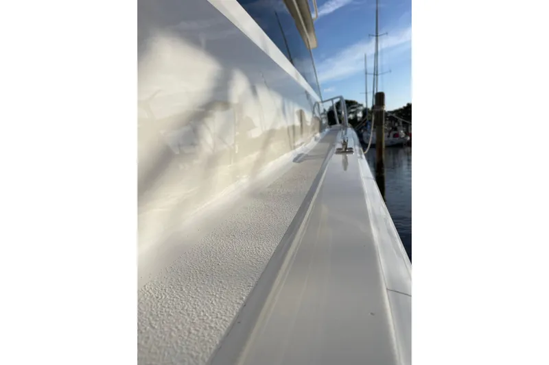  Yacht Photos Pics Close-up of 2003 Egg Harbor 37 Sport Fisher boat deck, docked at marina.