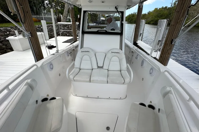  Yacht Photos Pics 2015 Everglades 295 Center Console boat interior with white seating and console.