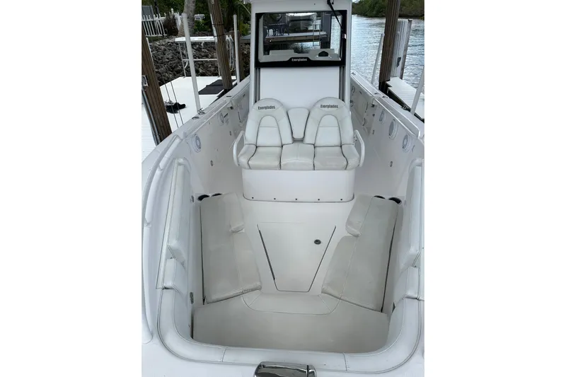  Yacht Photos Pics 2015 Everglades 295 Center Console boat interior with white seating and console.