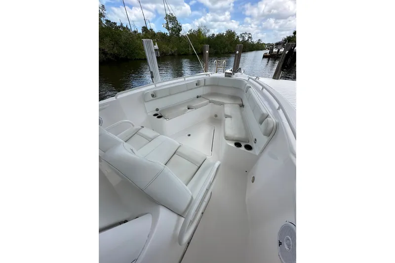  Yacht Photos Pics 2015 Everglades 295 Center Console boat interior with white seating and cup holders.