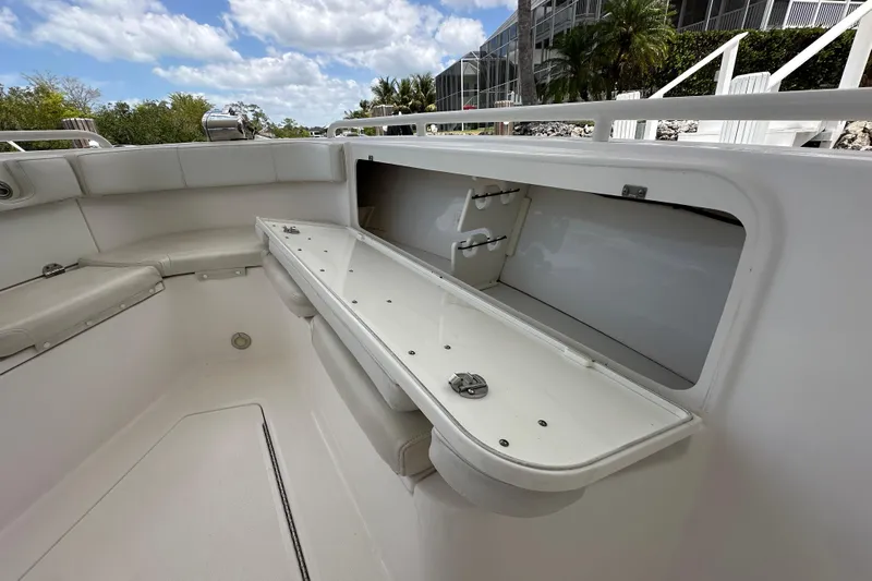  Yacht Photos Pics 2015 Everglades 295 Center Console boat interior with storage compartment open.
