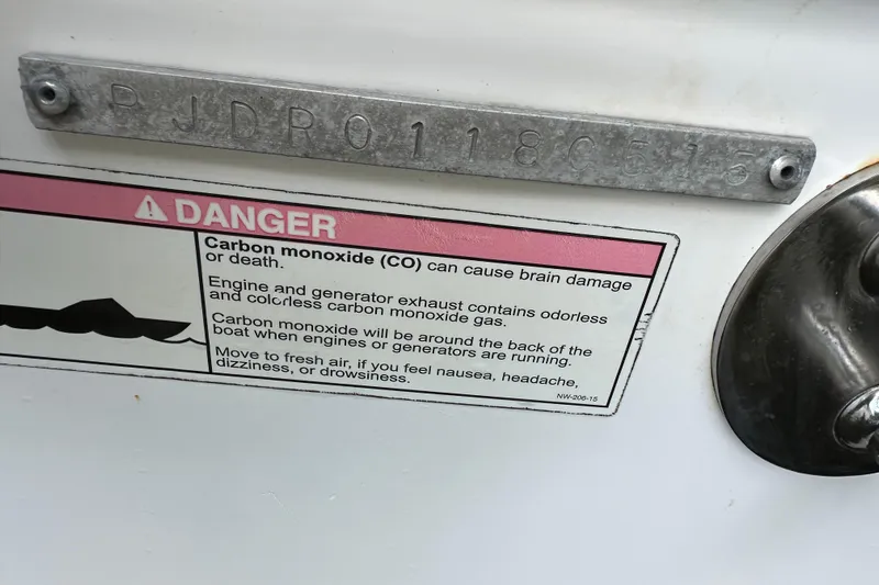  Yacht Photos Pics Warning label on 2015 Everglades 295 Center Console about carbon monoxide dangers.