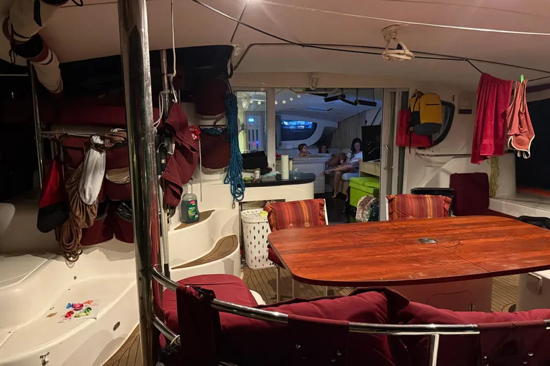 Manila Spirit Yacht Photos Pics Interior of a 2012 Dean 5000 yacht with dining area and cozy seating.