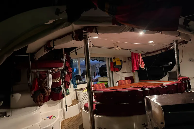 Manila Spirit Yacht Photos Pics Interior of a 2012 Dean 5000 yacht with cozy seating and ambient lighting.