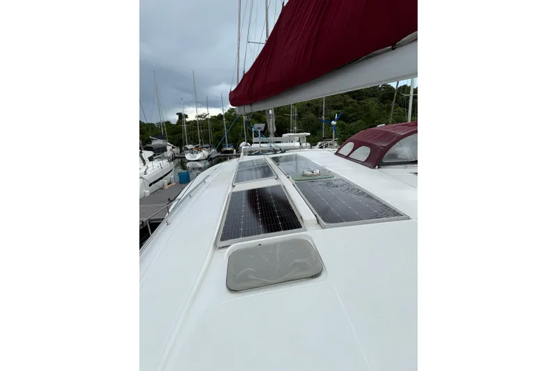 Manila Spirit Yacht Photos Pics Sailboat with solar panels on deck, Dean 5000 model, 2012, docked in marina.