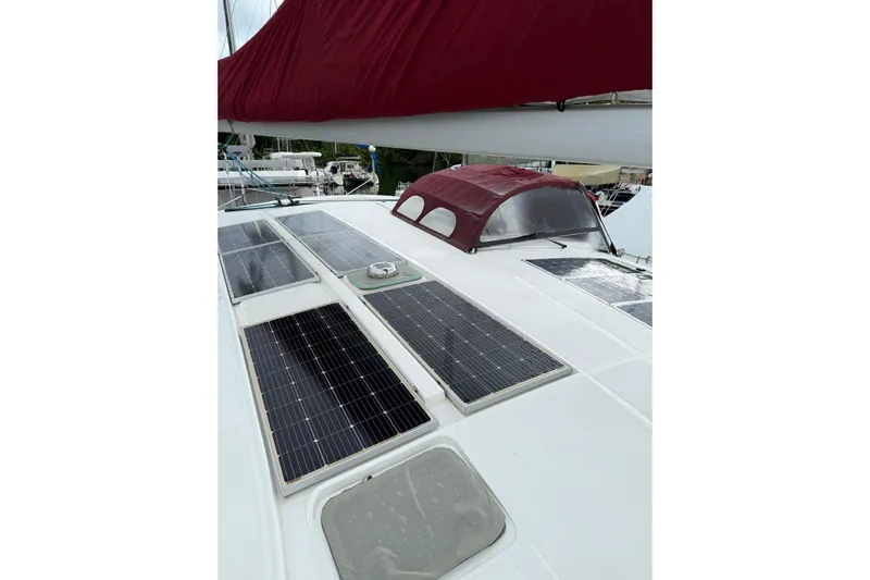 Manila Spirit Yacht Photos Pics 2012 Dean 5000 yacht with solar panels and maroon canopy.