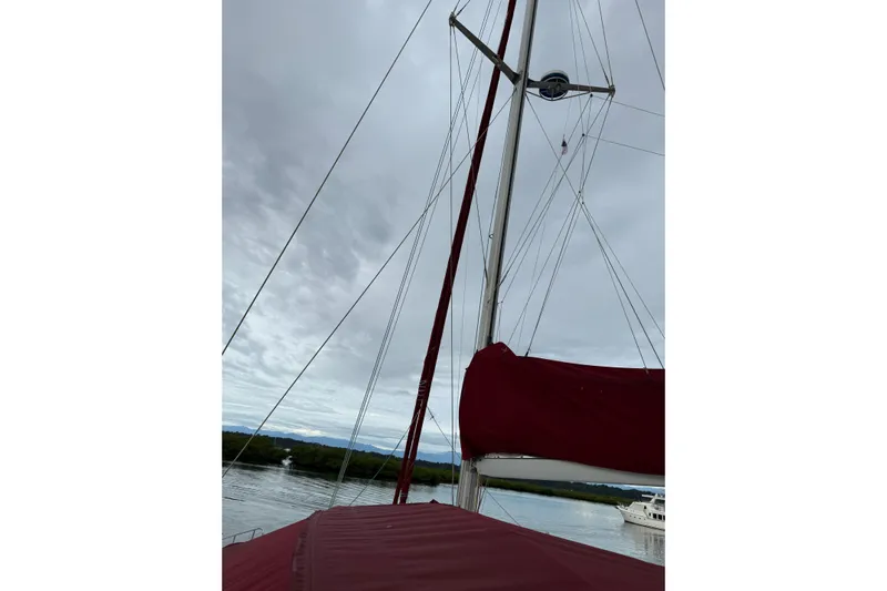 Manila Spirit Yacht Photos Pics Sailboat mast and rigging on a cloudy day, Dean 5000, 2012 model.