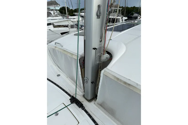 Manila Spirit Yacht Photos Pics Sailboat deck with mast and rigging, Dean 5000 model, 2012, docked at marina.