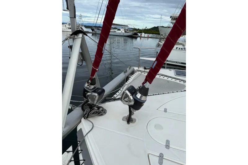 Manila Spirit Yacht Photos Pics Sailboat deck with red rigging, Dean 5000 model, 2012, docked in marina.