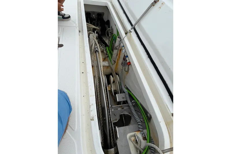 Manila Spirit Yacht Photos Pics Open compartment of a 2012 Dean 5000 boat showing mechanical components and wiring.