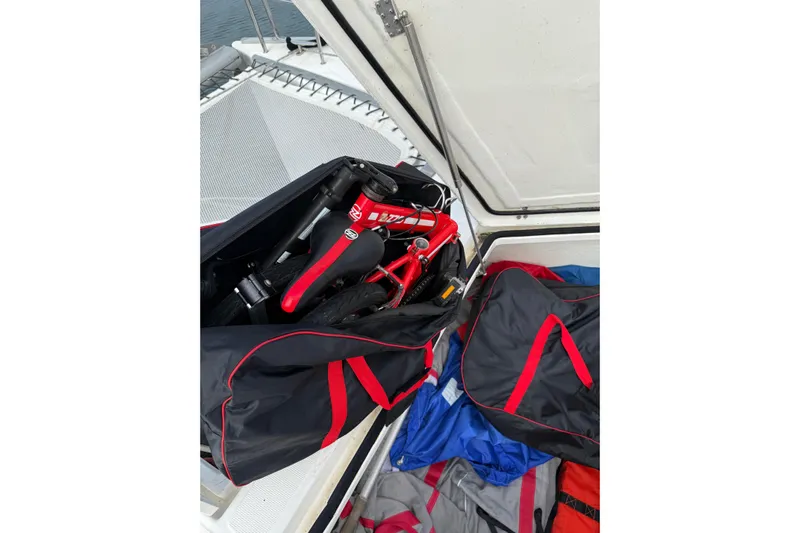 Manila Spirit Yacht Photos Pics Folded red bicycle in storage compartment, Dean 5000 model, 2012.