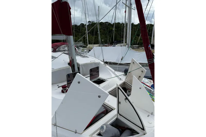 Manila Spirit Yacht Photos Pics Sailboat deck with open hatches, Dean 5000 model, 2012, docked in a marina.