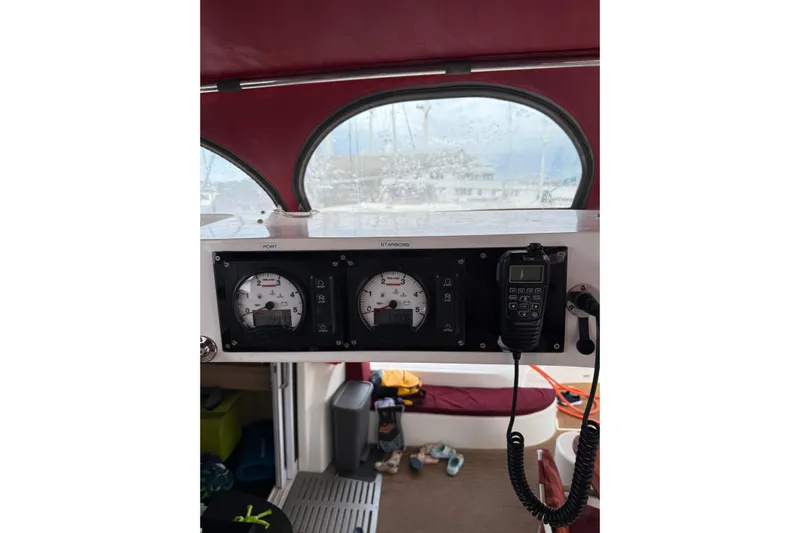 Manila Spirit Yacht Photos Pics Control panel of a 2012 Dean 5000 boat with gauges and radio.