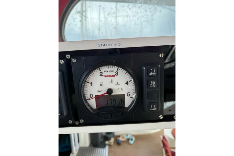 Manila Spirit Yacht Photos Pics Yanmar engine control panel on a 2012 Dean 5000 boat, showing RPM and hour meter.