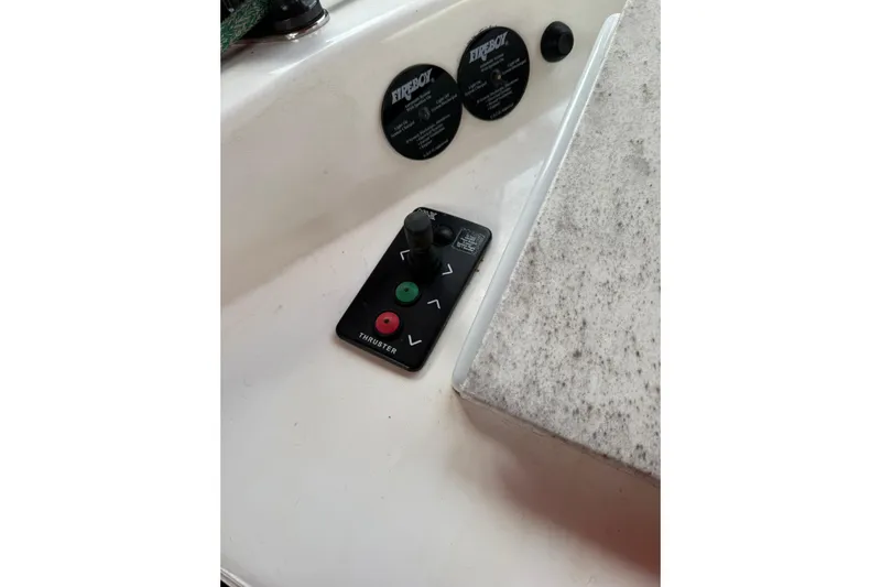 Manila Spirit Yacht Photos Pics Control panel of a 2012 Dean 5000 boat with thruster buttons.