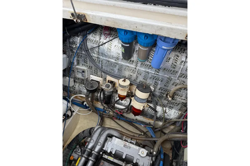 Manila Spirit Yacht Photos Pics Engine compartment of a 2012 Dean 5000 with filters and wiring.