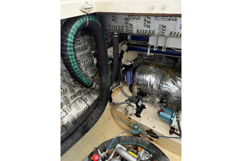 Manila Spirit Yacht Photos Pics Engine compartment of a 2012 Dean 5000 with hoses and insulation.