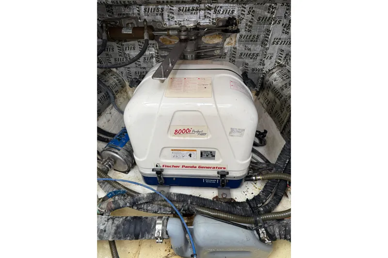 Manila Spirit Yacht Photos Pics Fischer Panda generator in a Dean 5000, 2012 model, surrounded by cables and insulation.