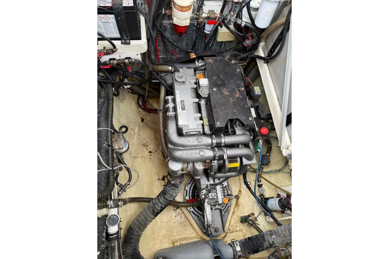 Manila Spirit Yacht Photos Pics Engine compartment of a 2012 Dean 5000, showcasing complex wiring and components.