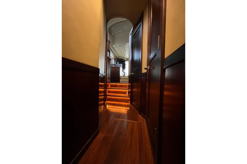 N/a Yacht Photos Pics Luxurious interior hallway of 2006 Sea Ray 52 Sedan Bridge yacht with wooden flooring.