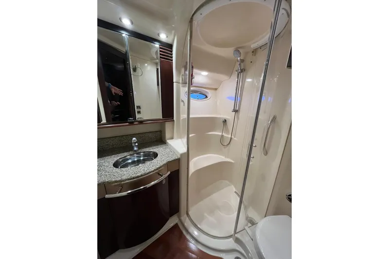 N/a Yacht Photos Pics Luxurious bathroom in 2006 Sea Ray 52 Sedan Bridge yacht with shower and sink.