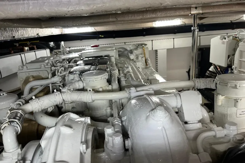 N/a Yacht Photos Pics Engine room of 2006 Sea Ray 52 Sedan Bridge yacht, showcasing complex machinery and components.