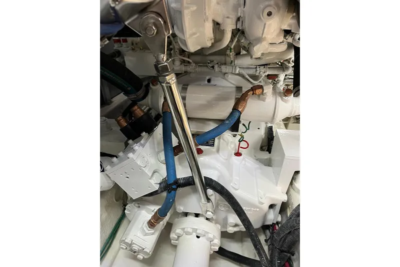 N/a Yacht Photos Pics Engine compartment of a 2006 Sea Ray 52 Sedan Bridge with visible hoses and components.