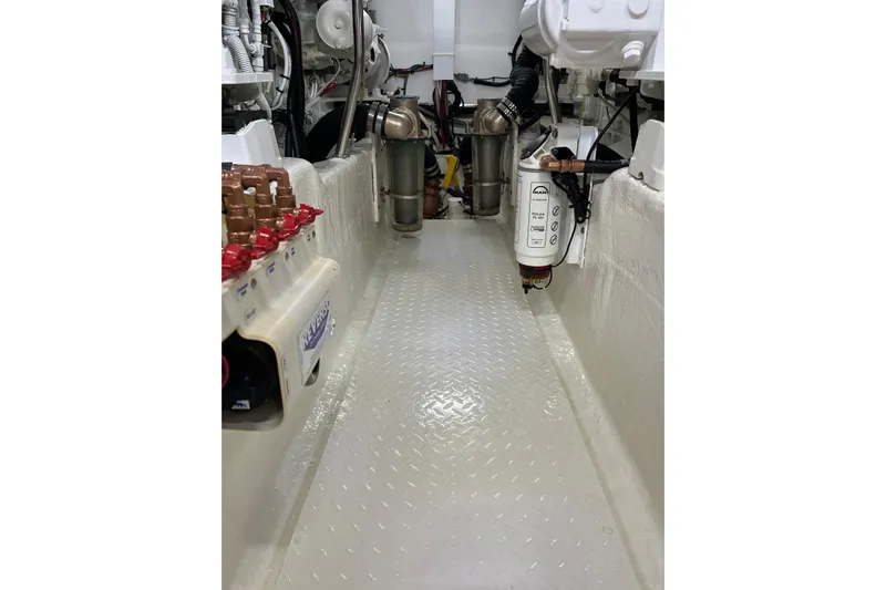 N/a Yacht Photos Pics Engine room of 2006 Sea Ray 52 Sedan Bridge yacht, showcasing mechanical components.