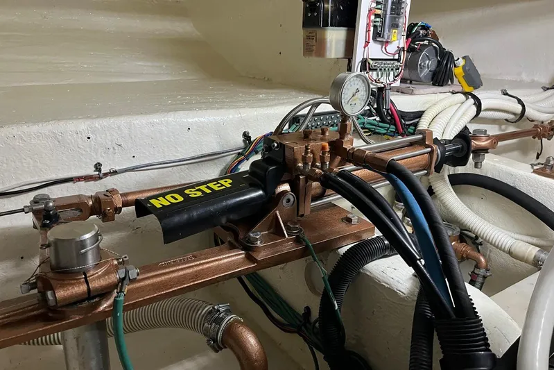 N/a Yacht Photos Pics Engine room of 2006 Sea Ray 52 Sedan Bridge with hydraulic and electrical components.