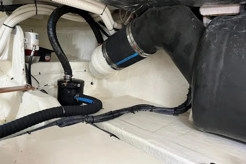 N/a Yacht Photos Pics Engine compartment of 2006 Sea Ray 52 Sedan Bridge with hoses and components.