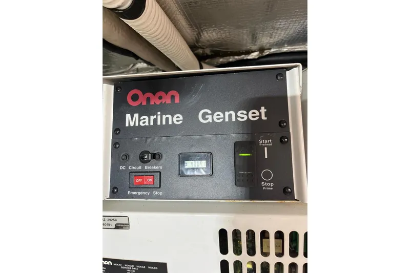 N/a Yacht Photos Pics Onan Marine Genset control panel on 2006 Sea Ray 52 Sedan Bridge.